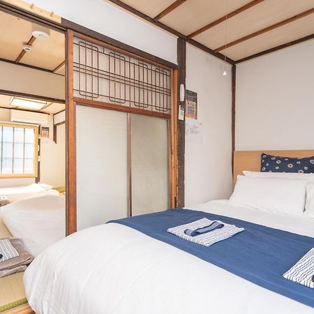 Guesthouse Oneworld Shijo四条京町屋 Kyoto Exteriör bild